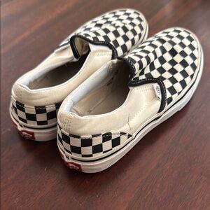Vans Black and White Checkerboard Slip-On Sneakers